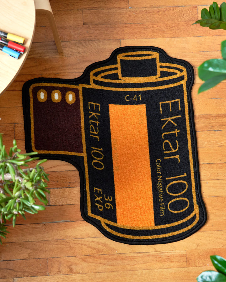 Add a Touch of Nostalgia with This Film Canister Rug - Limited Edition!